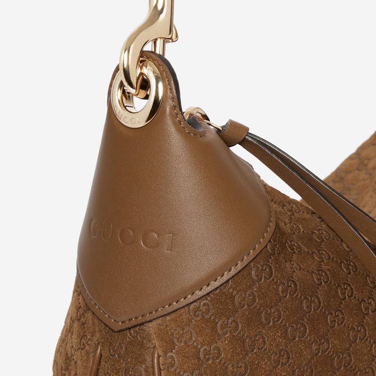 Gucci GG Monogram Embossed Suede Shoulder Bag — Brown